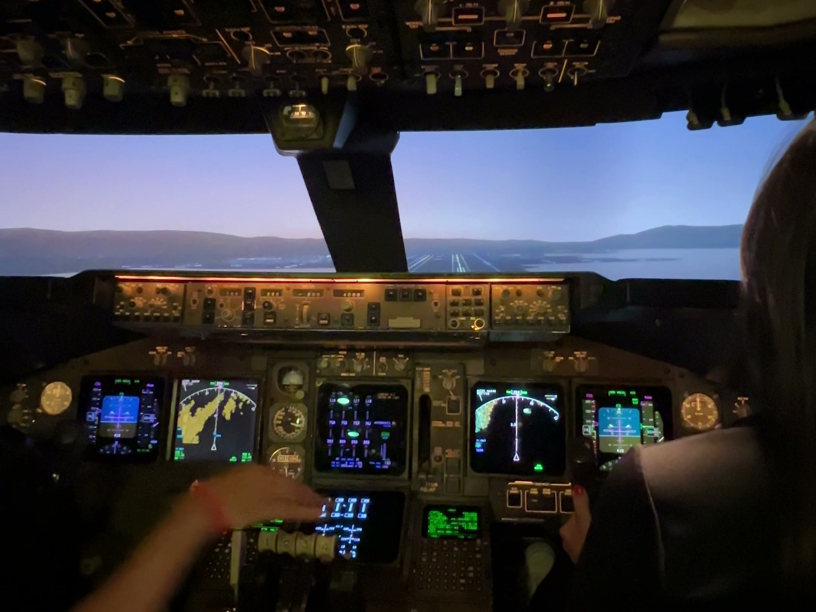 Two pilots training together in the full-motion Boeing 737 simulator at Air Vegas Services